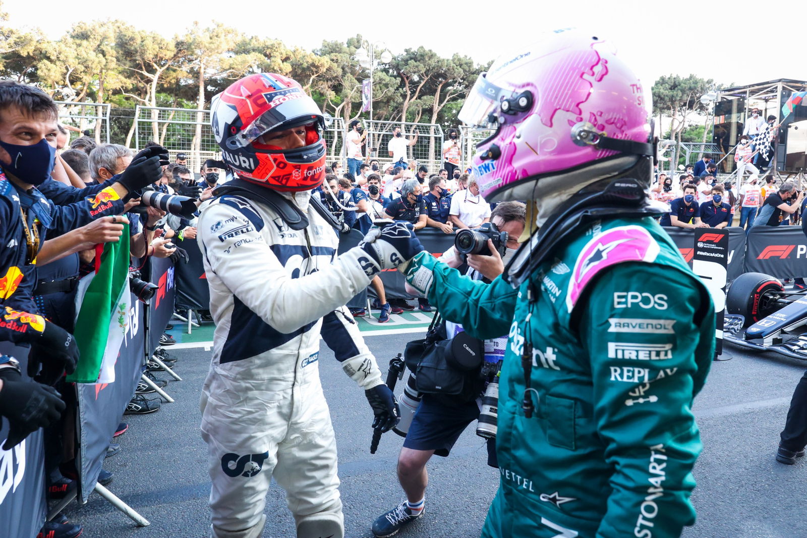 (L to R): Pierre Gasly (FRA) AlphaTauri celebrates his third position with second placed Sebastian Vettel (GER) Aston Martin