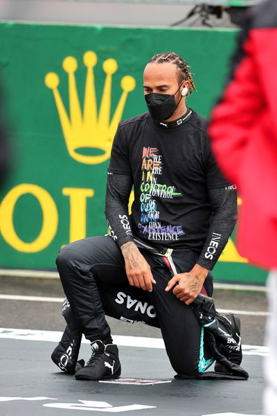 Lewis Hamilton (GBR) Mercedes AMG F1 W12 takes the