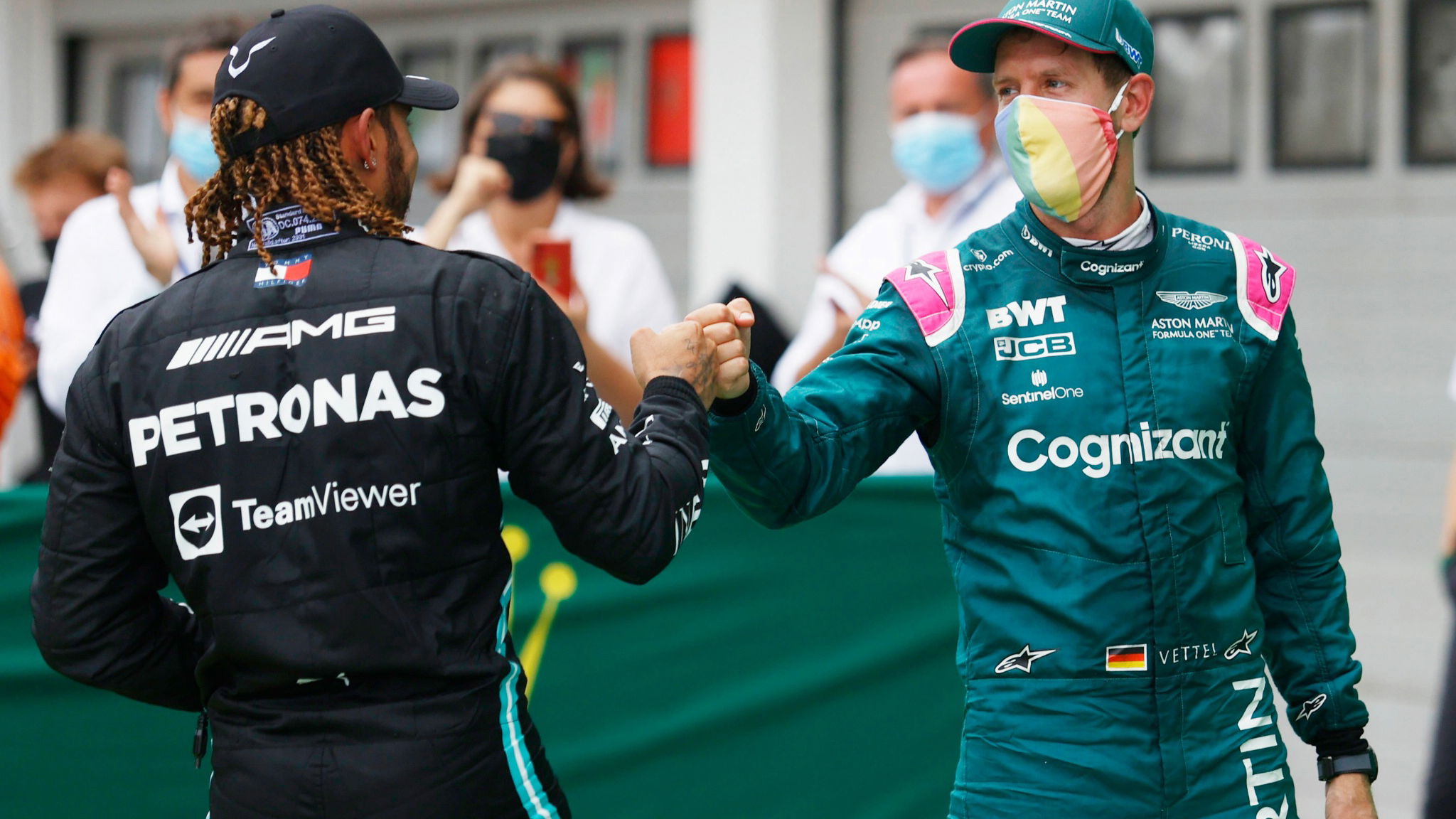 Lewis Hamilton (GBR) Mercedes AMG F1 celebrates his third position with second placed Sebastian Vettel (GER) Aston Martin F1