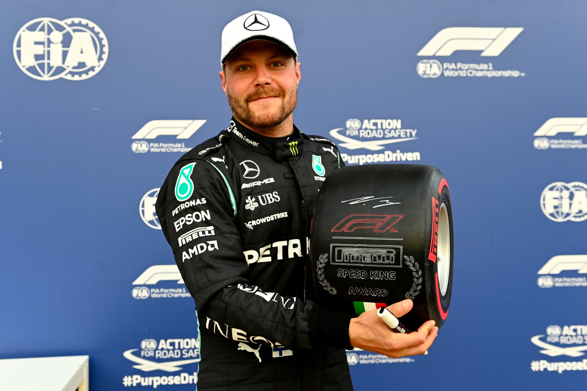 Valtteri Bottas (FIN) Mercedes AMG F1 celebrates being fastest in qualifying parc ferme with the Pirelli Speed King