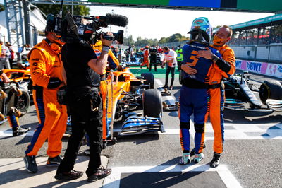 Race winner Daniel Ricciardo (AUS) McLaren celebrates with the team in parc