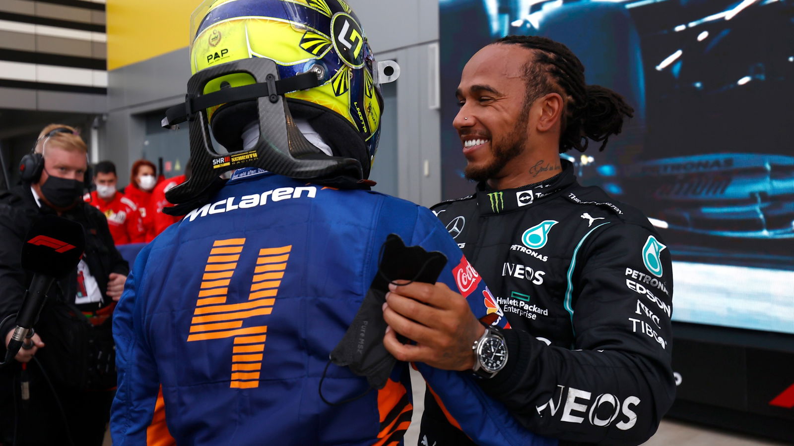 (L to R): Lando Norris (GBR) McLaren with race winner Lewis Hamilton (GBR) Mercedes AMG F1 in parc