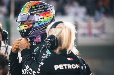 Lewis Hamilton (GBR) Mercedes AMG F1 with Angela Cullen (NZL) Mercedes AMG F1 Physiotherapist on the