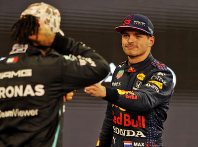 Max Verstappen (NLD) Red Bull Racing celebrates his pole position with second placed Lewis Hamilton (GBR) Mercedes AMG F1 in