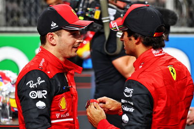 (L to R): Charles Leclerc (MON) Ferrari with team mate Carlos Sainz Jr (ESP) Ferrari in qualifying parc