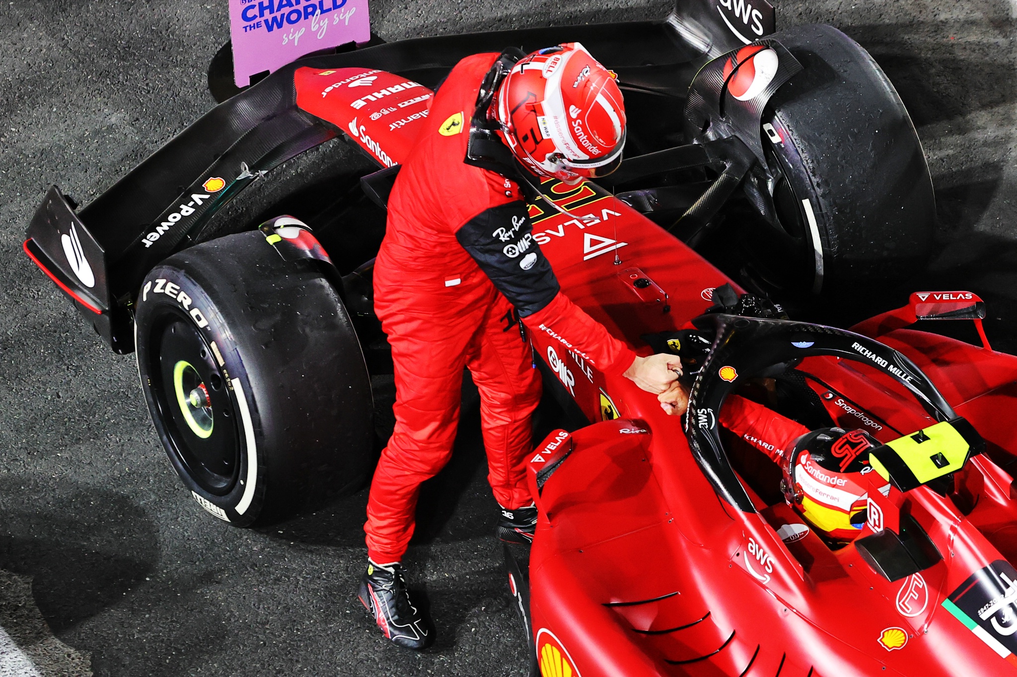 Charles Leclerc (MON) Ferrari F1-75 celebrates hch second position with third placed team mate Carlos Sainz Jr (ESP)
