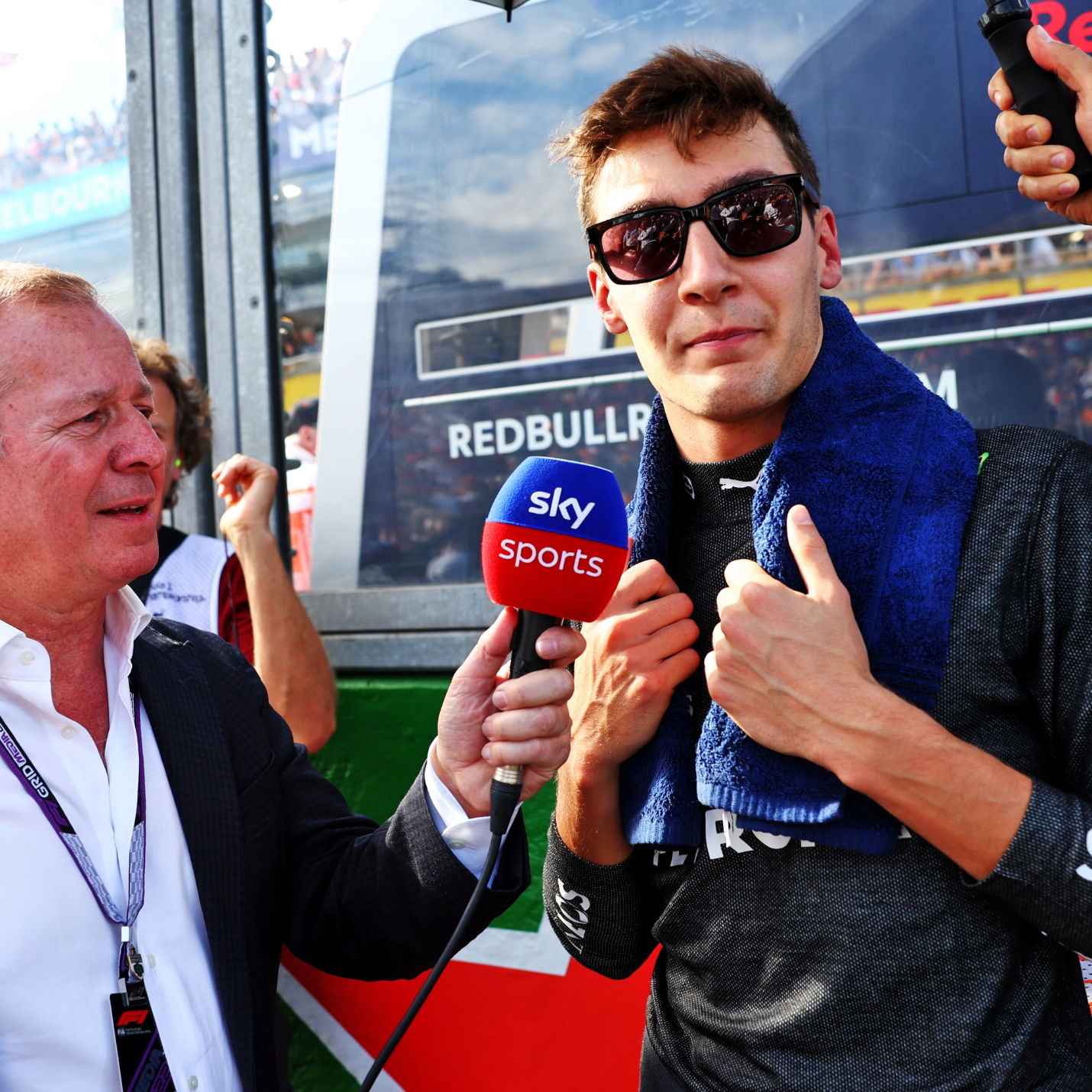 Martin Brundle (GBR) Sky Sports Commentator with George Russell (GBR) Mercedes AMG F1 on the grid. Formula 1 World