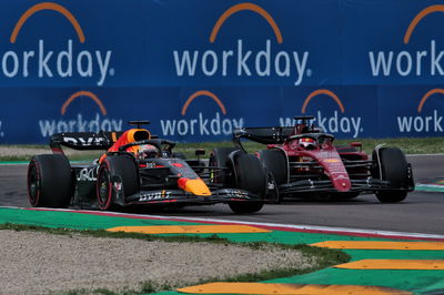 Max Verstappen (NLD) Red Bull Racing RB18 and Charles Leclerc (MON) Ferrari F1-75 battle for the lead of the Sprint.