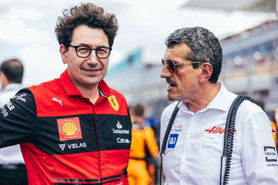 (L to R): Mattia Binotto (ITA) Ferrari Team Principal with Guenther Steiner (ITA) Haas F1 Team Prinicipal on the grid.
