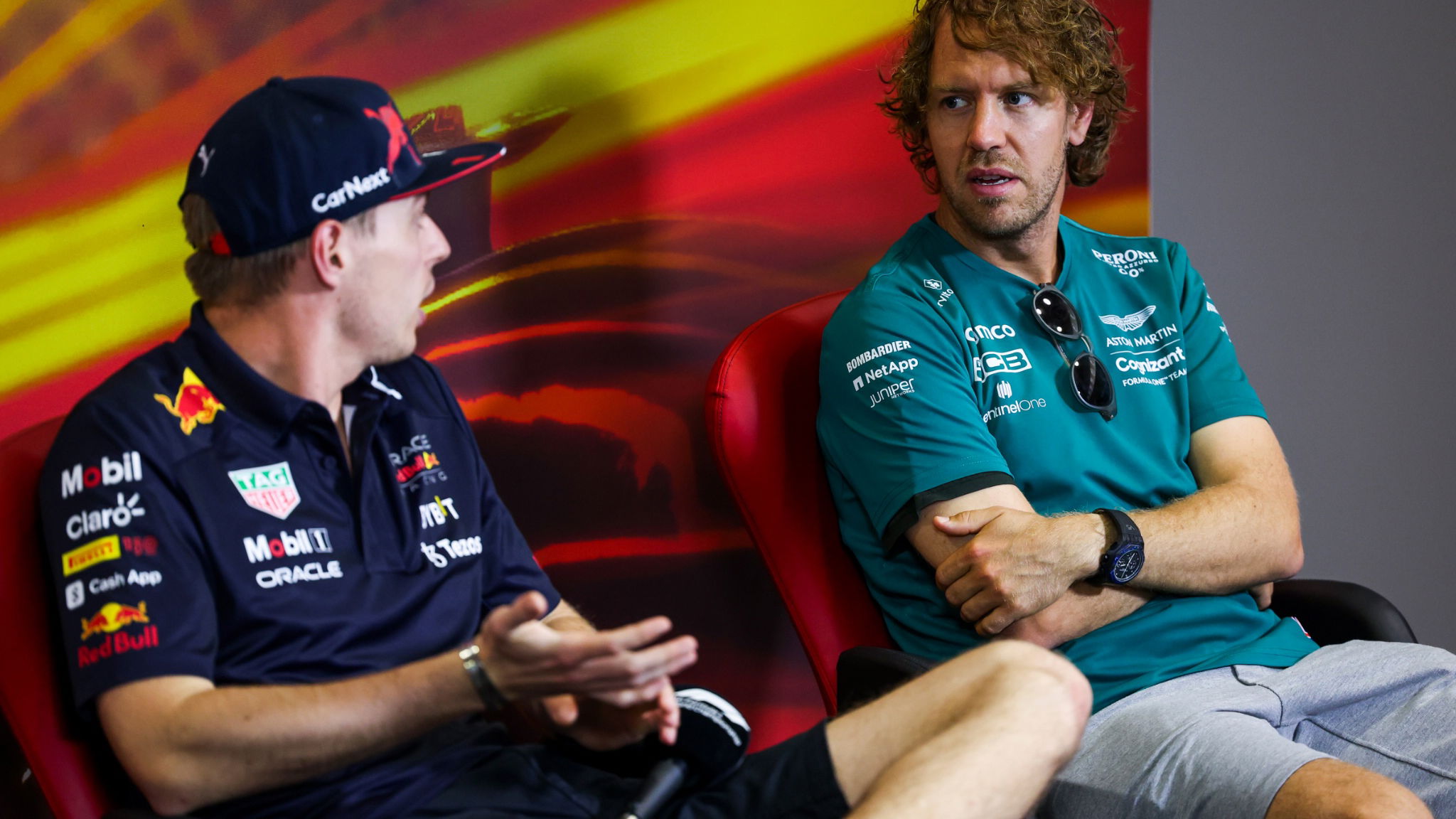 Sebastian Vettel (GER) Aston Martin F1 Team (Right) and Max Verstappen (NLD) Red Bull Racing in the FIA Press Conference.
