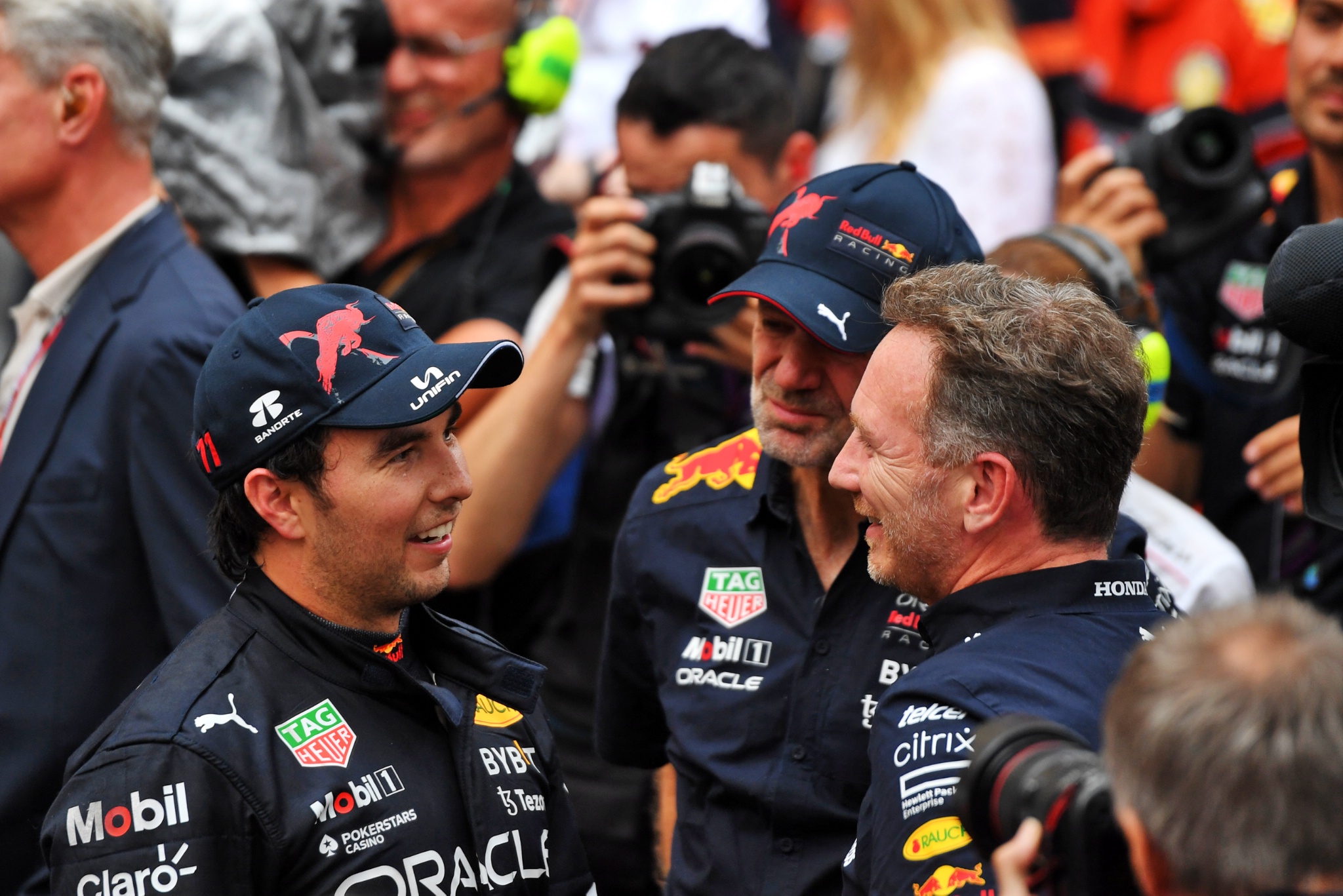 (L to R): Race winner Sergio Perez (MEX) Red Bull Racing in parc ferme with Adrian Newey (GBR) Red Bull Racing Chief