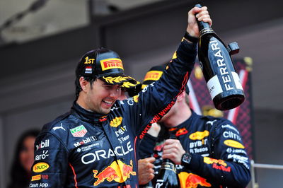 Race winner Sergio Perez (MEX) Red Bull Racing celebrates on the podium. Formula 1 World Championship, Rd 7, Monaco Grand