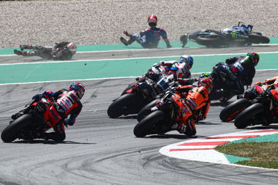 Alex Rins and Takaaki Nakagami after crashing out, Catalunya MotoGP. 5 July