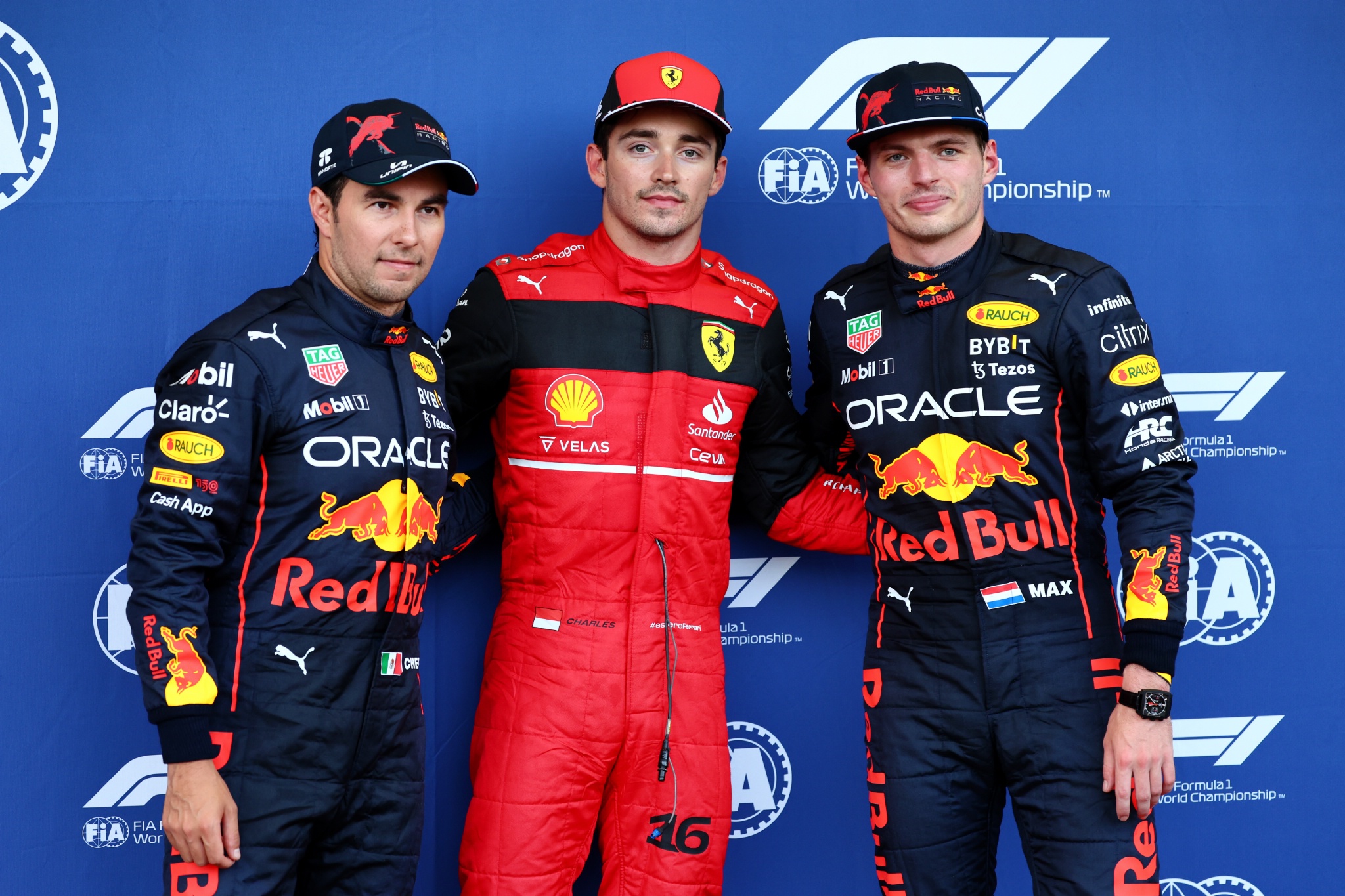 Qualifying top three in parc ferme (L to R): Sergio Perez (MEX) Red Bull Racing, second; Charles Leclerc (MON) Ferrari, pole