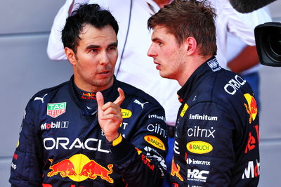 (L to R): Second placed Sergio Perez (MEX) Red Bull Racing in parc ferme with team mate and race winner Max Verstappen (NLD)