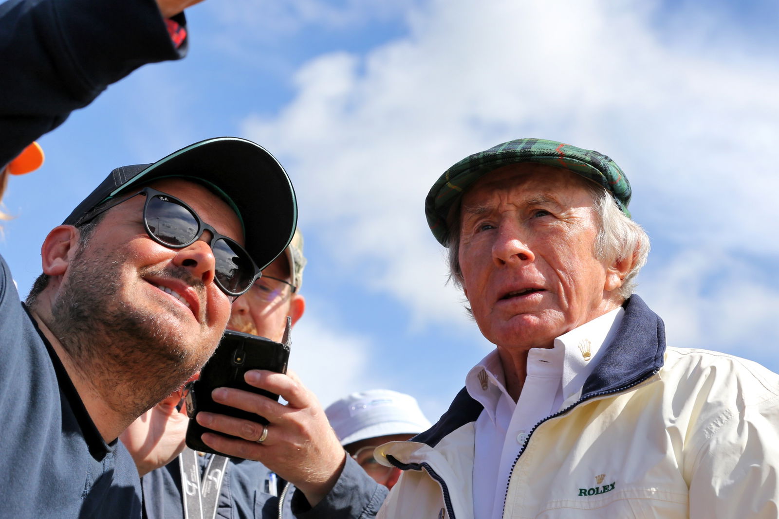 Jackie Stewart (GBR) with fans. Formula 1 World Championship, Rd 10, British Grand Prix, Silverstone, England, Race