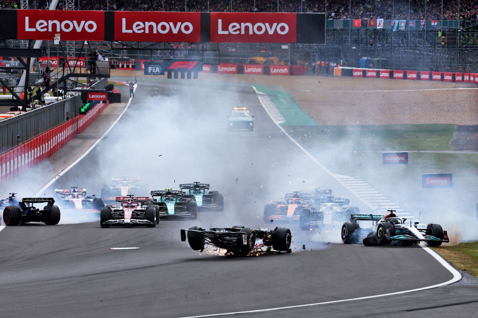 Guanyu Zhou (CHN) Alfa Romeo F1 Team C42 crashes at the start of the race. Formula 1 World Championship, Rd 10, British