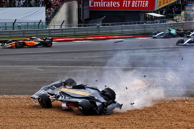 Guanyu Zhou (CHN) Alfa Romeo F1 Team C42 crashes at the start of the race. Formula 1 World Championship, Rd 10, British