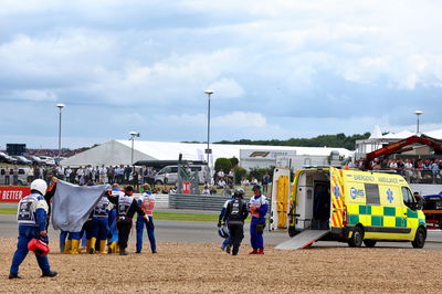 Guanyu Zhou (CHN) Alfa Romeo F1 Team is taken away on a stretcher into an ambulance after he crashed at the start of the