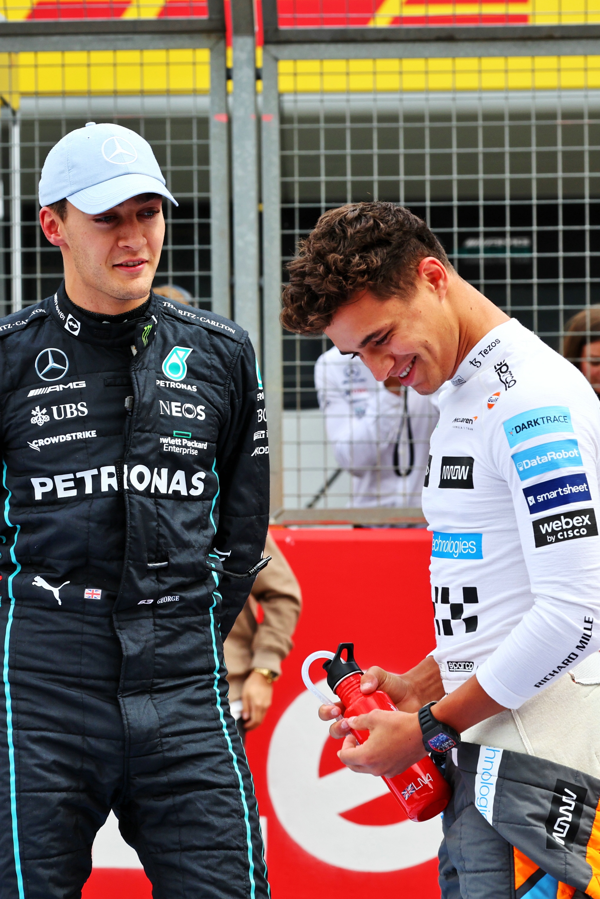 (L to R): George Russell (GBR) Mercedes AMG F1 with Lando Norris (GBR) McLaren on the grid. Formula 1 World Championship,