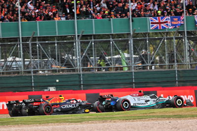 Lewis Hamilton (GBR) Mercedes AMG F1 W13; Sergio Perez (MEX) Red Bull Racing RB18; and Charles Leclerc (MON) Ferrari F1-75,