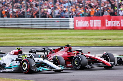 Lewis Hamilton (GBR) Mercedes AMG F1 W13 and Charles Leclerc (MON) Ferrari F1-75 battle for position. Formula 1 World