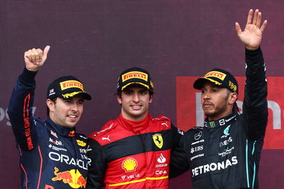 1st place Carlos Sainz Jr (ESP) Ferrari F1-75, with 2nd place Sergio Perez (MEX) Red Bull Racing RB18 and 3rd place Lewis