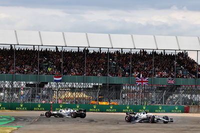 Yuki Tsunoda (JPN) AlphaTauri AT03 and Pierre Gasly (FRA) AlphaTauri AT03 spin off the track. Formula 1 World