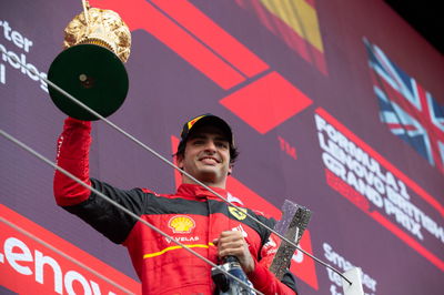 Race winner Carlos Sainz Jr (ESP) Ferrari celebrates on the podium. Formula 1 World Championship, Rd 10, British Grand