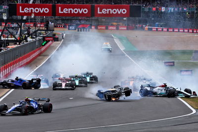 Guanyu Zhou (CHN) Alfa Romeo F1 Team C42; George Russell (GBR) Mercedes AMG F1 W13; and Alexander Albon (THA) Williams