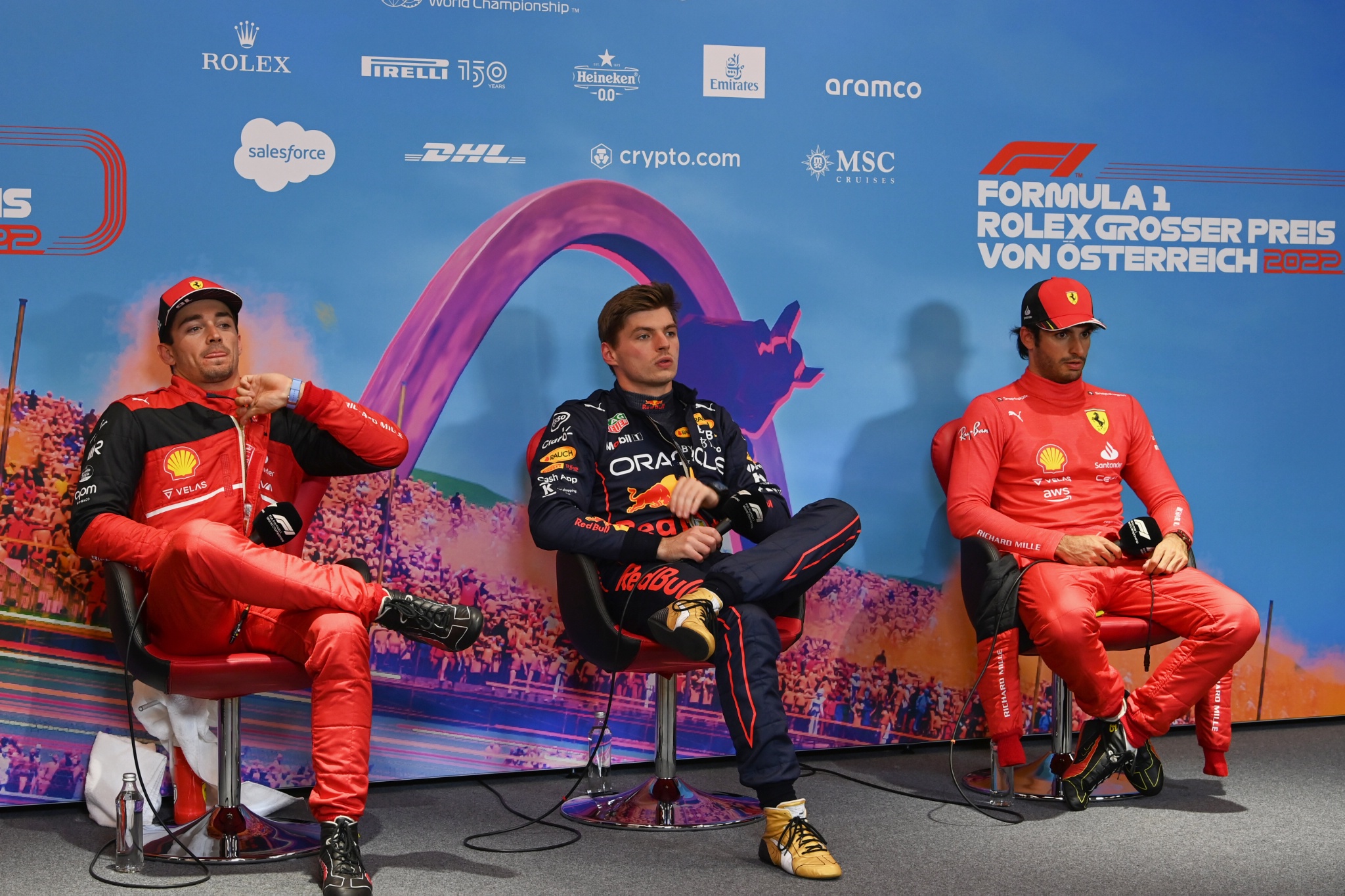 (L to R): Charles Leclerc (MON) Ferrari; Max Verstappen (NLD) Red Bull Racing; and Carlos Sainz Jr (ESP) Ferrari, in the FIA