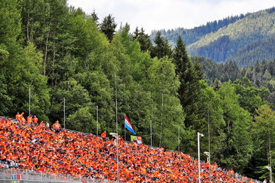 Circuit atmosphere - fans in the grandstands. Formula 1 World Championship, Rd 11, Austrian Grand Prix, Spielberg,