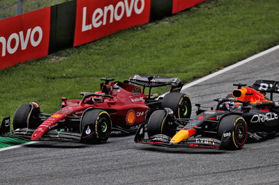 Max Verstappen (NLD) Red Bull Racing RB18 and Charles Leclerc (MON) Ferrari F1-75 battle for position. Formula 1 World