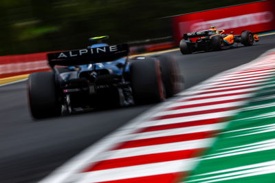 Lando Norris (GBR), McLaren F1 Team and Esteban Ocon (FRA), Alpine F1 Team Formula 1 World Championship, Rd 13, Hungarian