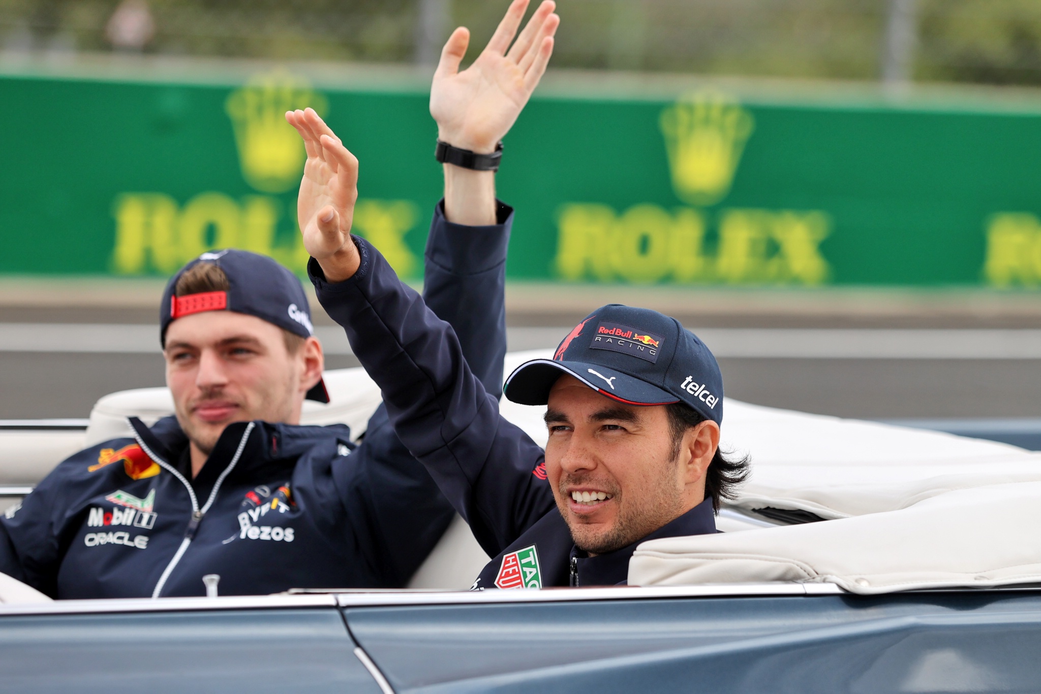Sergio Perez (MEX) Red Bull Racing and team mate Max Verstappen (NLD) Red Bull Racing on the drivers parade. Formula 1