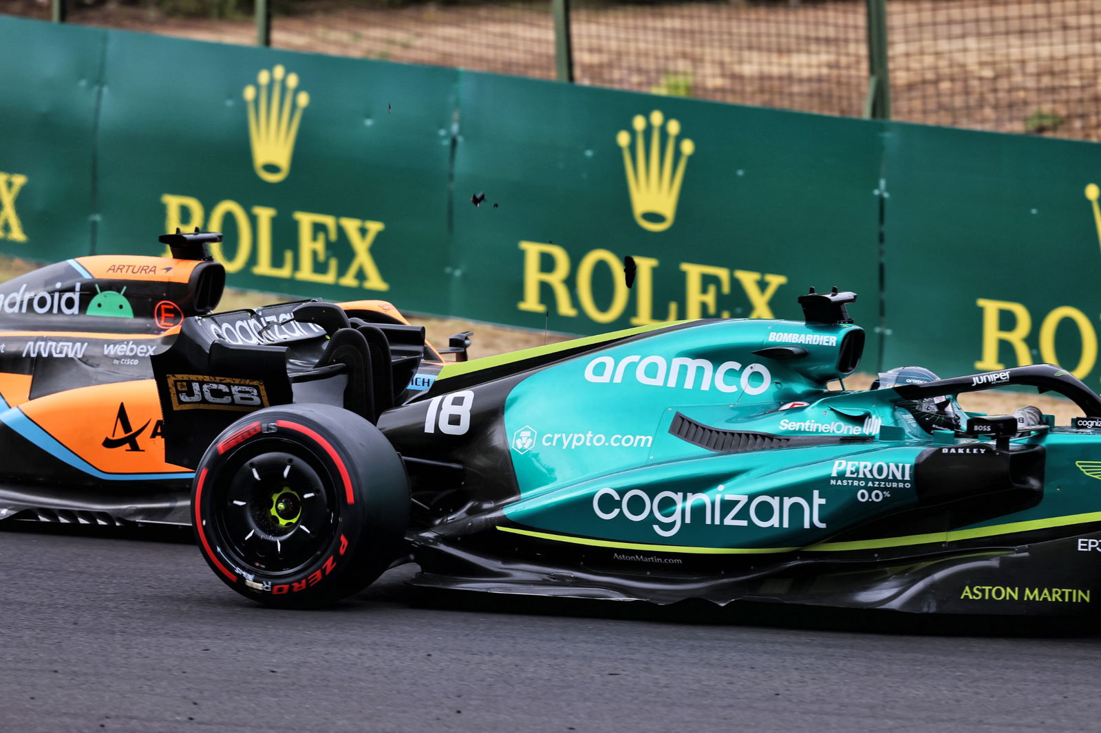 Lance Stroll (CDN) Aston Martin F1 Team AMR22 and Daniel Ricciardo (AUS) McLaren MCL36 collide. Formula 1 World