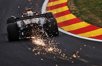 Daniel Ricciardo (AUS) McLaren MCL36 sends sparks flying. Formula 1 World Championship, Rd 14, Belgian Grand Prix, Spa