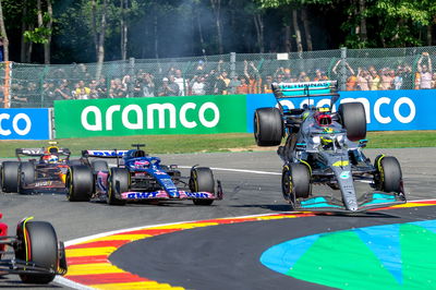 Lewis Hamilton (GBR) Mercedes AMG F1 W13 crashes with Fernando Alonso (ESP) Alpine F1 Team A522 at the start of the race.