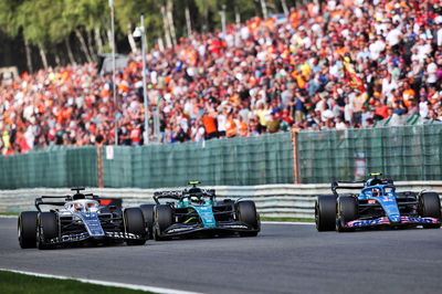 (L to R): Pierre Gasly (FRA) AlphaTauri AT03; Sebastian Vettel (GER) Aston Martin F1 Team AMR22; and Esteban Ocon (FRA)