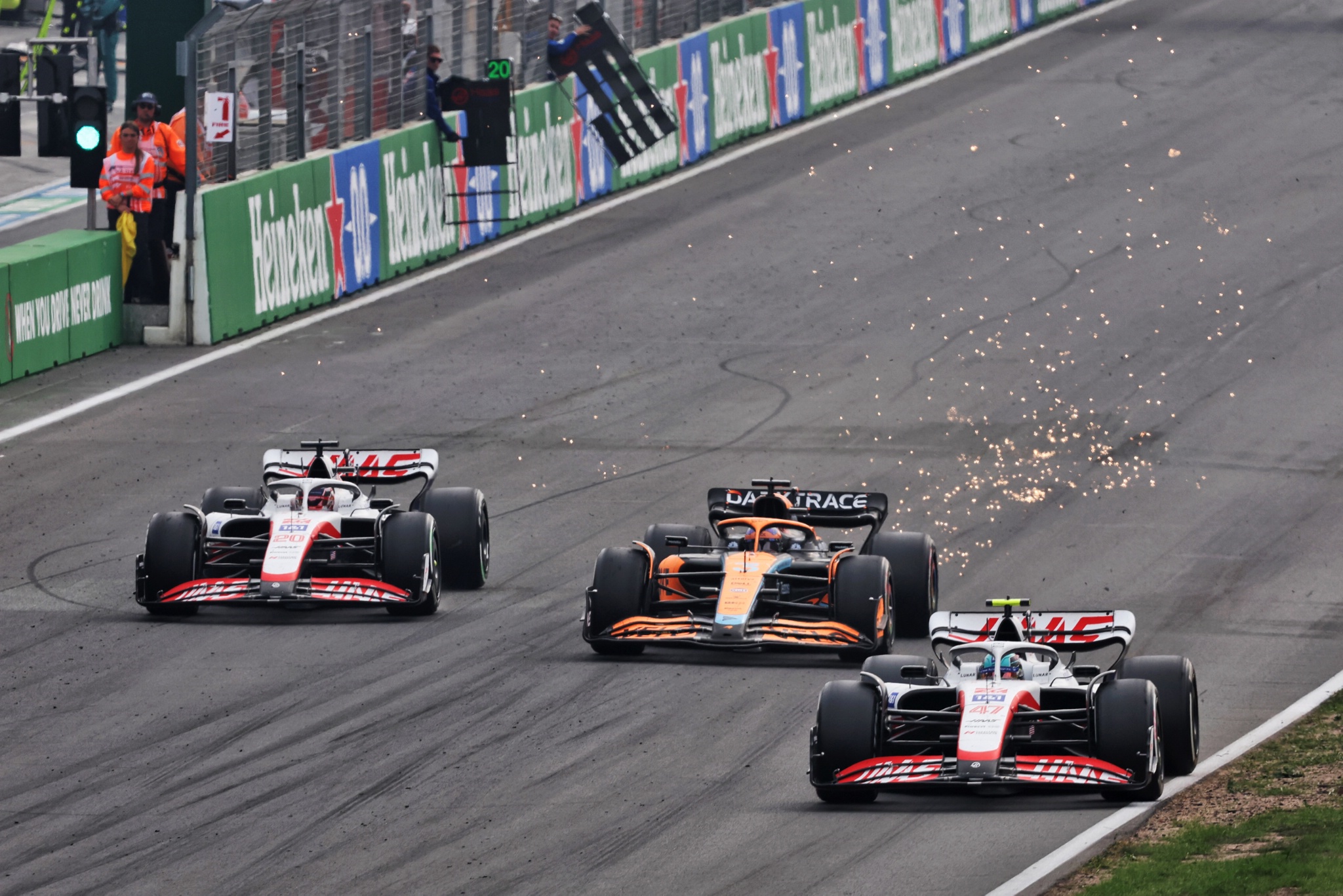 (L to R): Kevin Magnussen (DEN) Haas VF-22; Daniel Ricciardo (AUS) McLaren MCL36; and Mick Schumacher (GER) Haas VF-22.