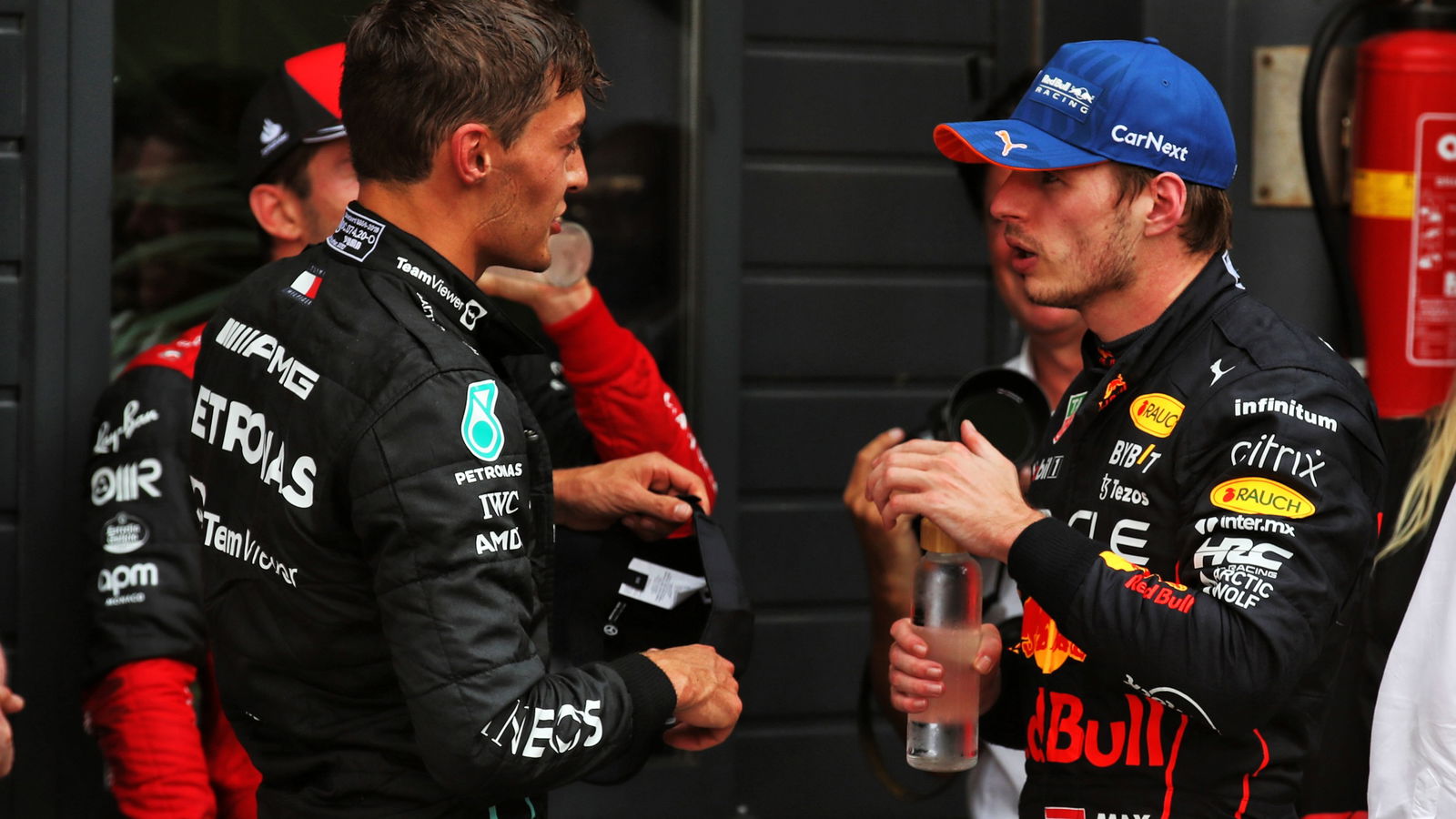 (L to R): George Russell (GBR) Mercedes AMG F1 with Max Verstappen (NLD) Red Bull Racing in parc ferme. Formula 1 World