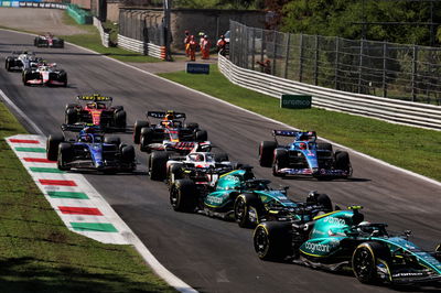 Sebastian Vettel (GER) Aston Martin F1 Team AMR22 and Lance Stroll (CDN) Aston Martin F1 Team AMR22 at the start of the