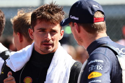 Charles Leclerc (MON) Ferrari F1-75 and Max Verstappen (NLD) Red Bull Racing RB18. Formula 1 World Championship, Rd 16,