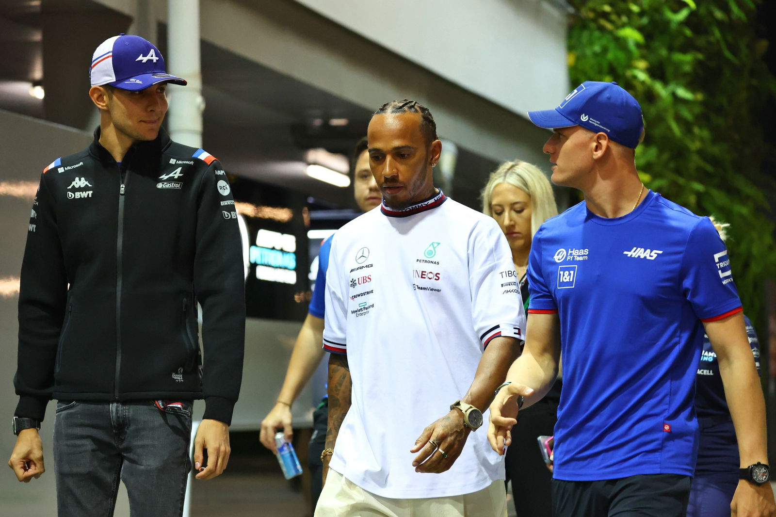 (L to R): Esteban Ocon (FRA) Alpine F1 Team with Lewis Hamilton (GBR) Mercedes AMG F1 and Mick Schumacher (GER) Haas F1