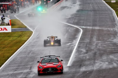 Max Verstappen (NLD) Red Bull Racing RB18 leads behind the Mercedes AMG FIA Safety Car. Formula 1 World Championship, Rd