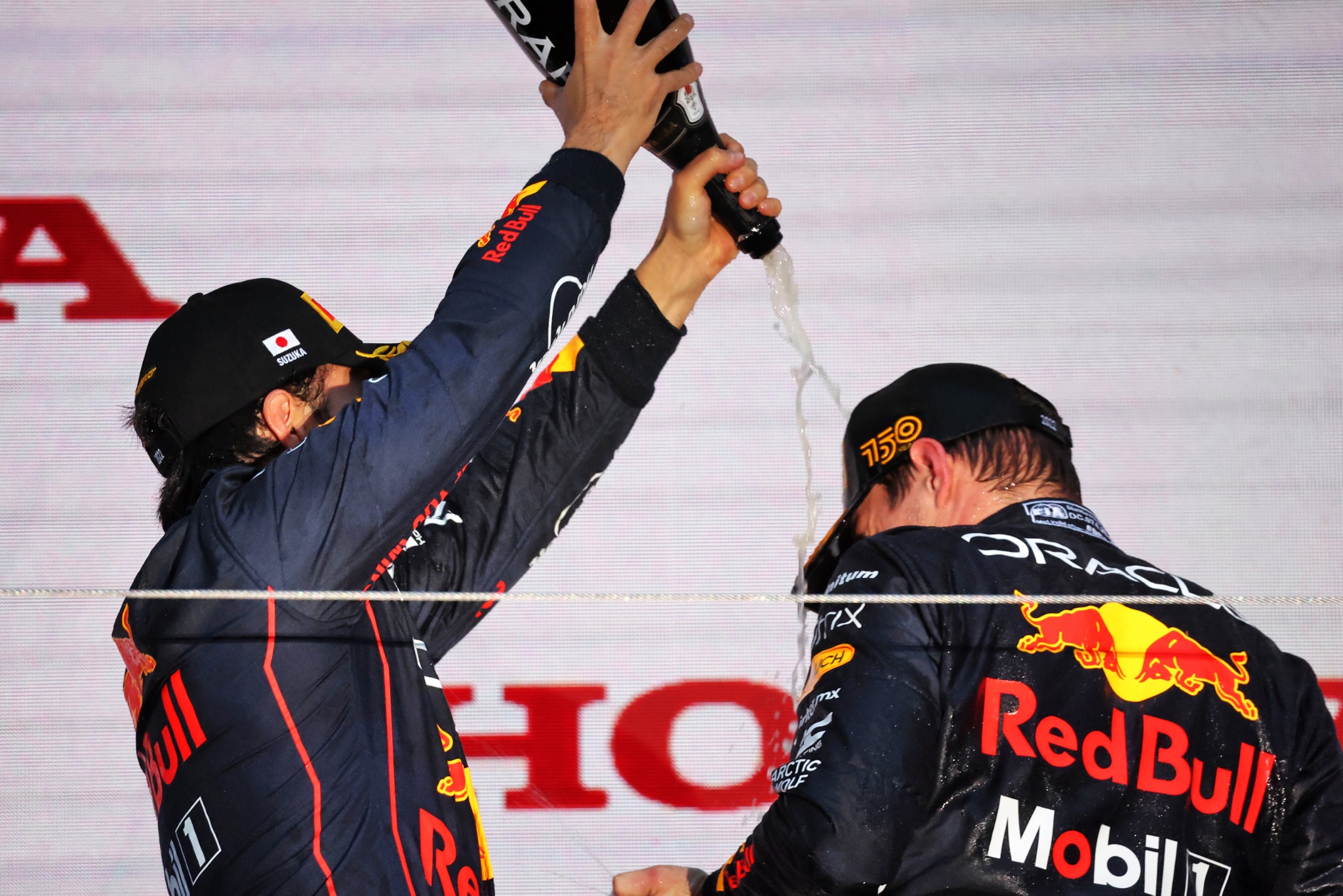 (L to R): Sergio Perez (MEX) Red Bull Racing celebrates with team mate and race winner Max Verstappen (NLD) Red Bull
