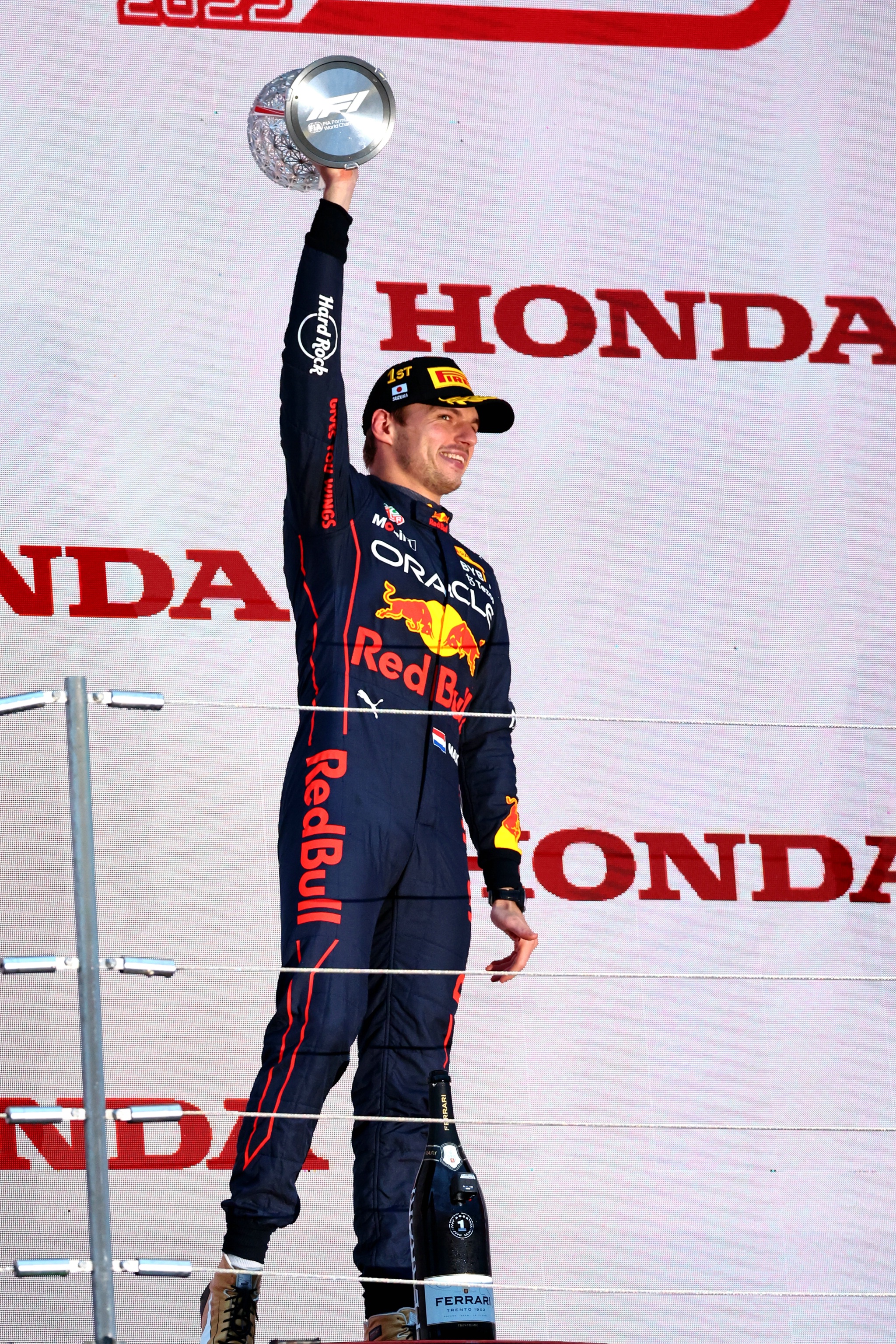 Race winner Max Verstappen (NLD) Red Bull Racing celebrates on the podium. Formula 1 World Championship, Rd 18, Japanese