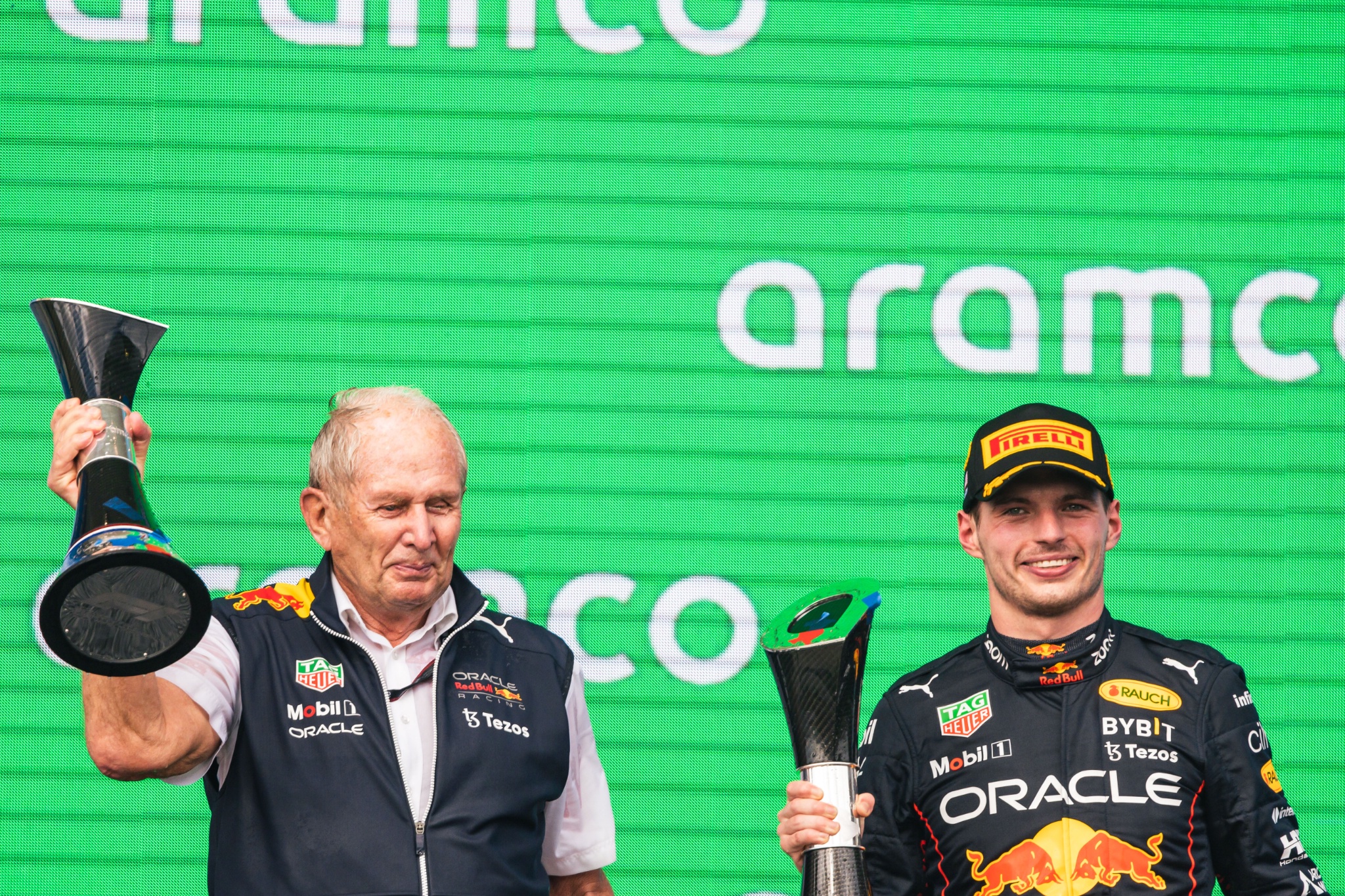 (L to R): Dr Helmut Marko (AUT) Red Bull Motorsport Consultant celebrates on the podium with Max Verstappen (NLD) Red Bull