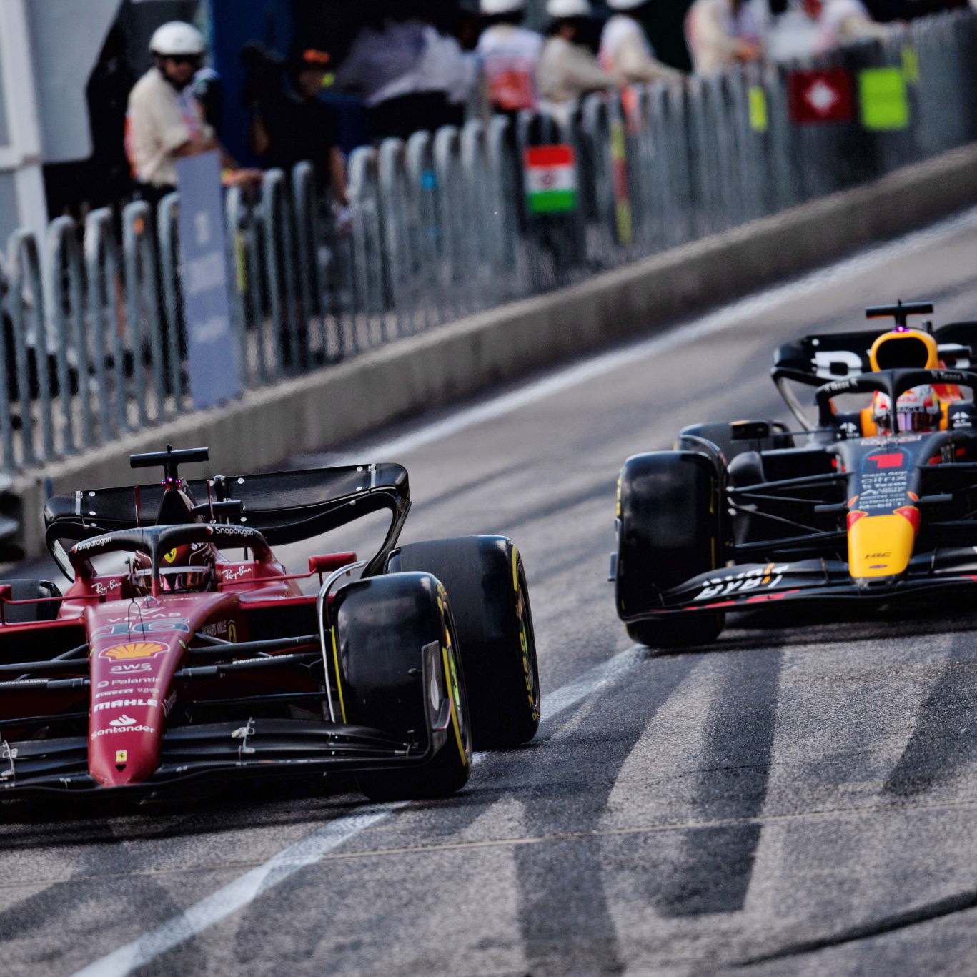 Charles Leclerc (MON) Ferrari F1-75 and Max Verstappen (NLD) Red Bull Racing RB18. Formula 1 World Championship, Rd 19,