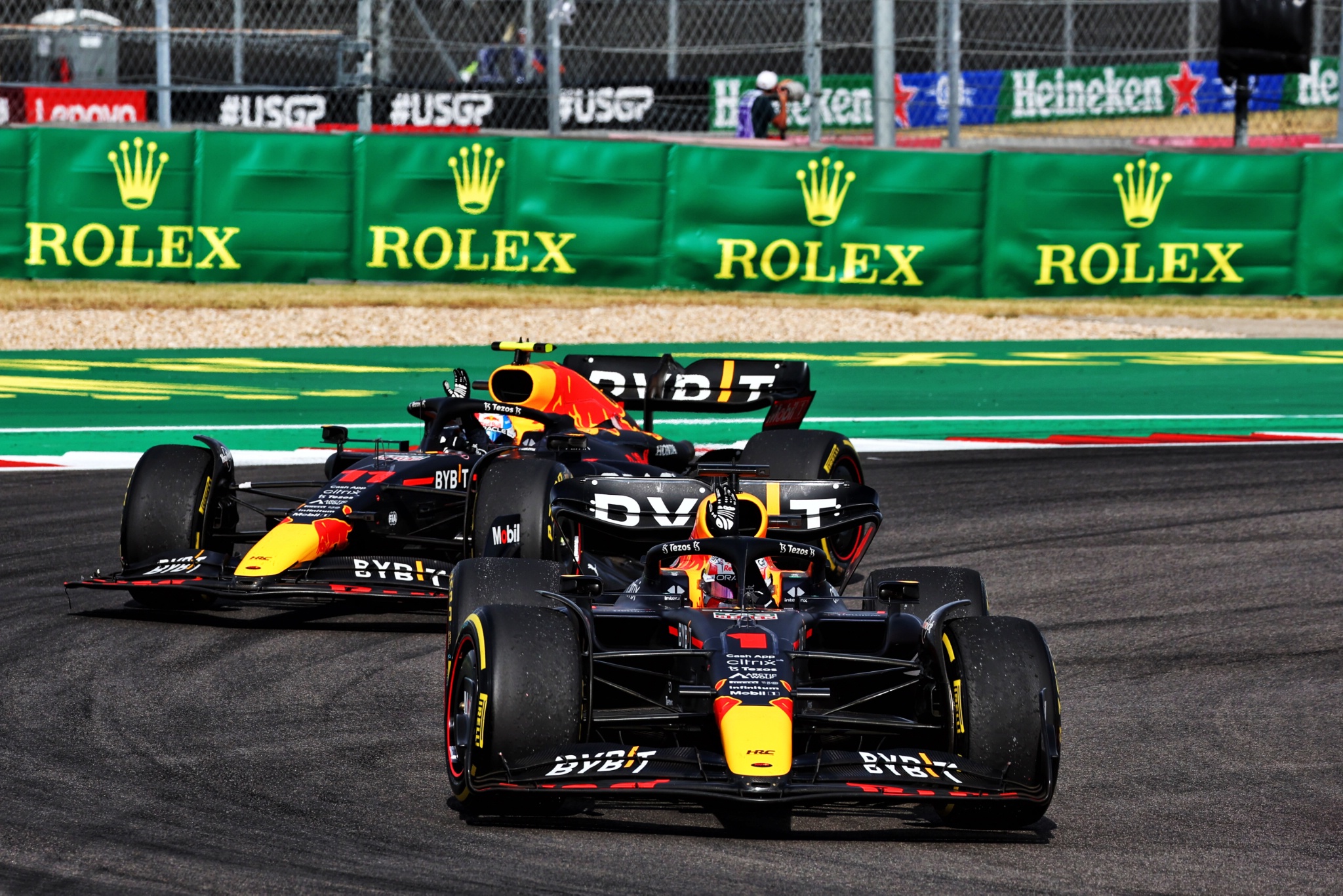 Race winner Max Verstappen (NLD) Red Bull Racing RB18 celebrates at the end of the race with team mate Sergio Perez (MEX)